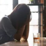 woman upset struggling with alcoholism