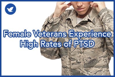 Sad female airman with head in hands against white background