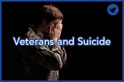Despondent young soldier covering his face with hands.